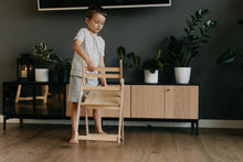 Last inn bildet i Galleri-visningsprogrammet, første barnestol i tre